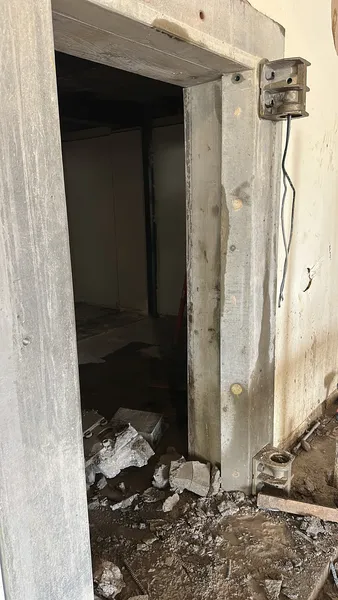 Commercial vault door demolition completed with door and hardware fully removed